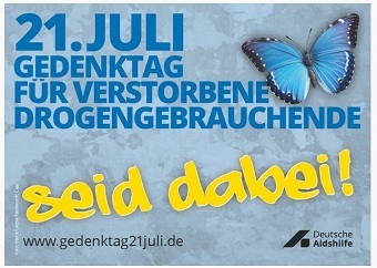 Schriftzug des Gedenktages mit dem Aufruf "seid dabei" und einem blauen Schmetterling